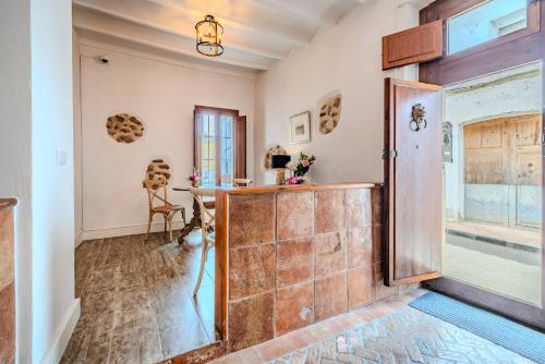 a home office with a counter and a window at Casa Rural Lliber in Lliber