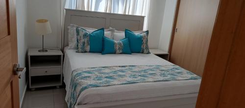 Postel nebo postele na pokoji v ubytování Apartamento en Boca Chica T2 611