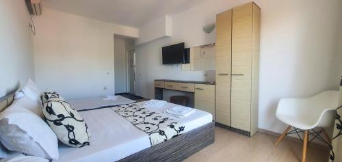 Postel nebo postele na pokoji v ubytování Anacris Guesthouse