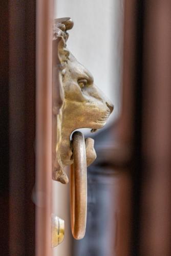 a statue of a dog with a cigar in its mouth at Casa Rural Lliber in Lliber