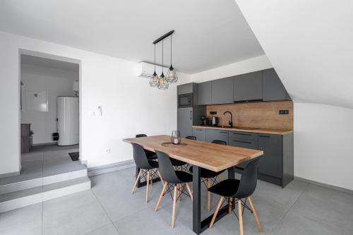 Kuchyň nebo kuchyňský kout v ubytování The Houses - Chata u sjezdovky 2