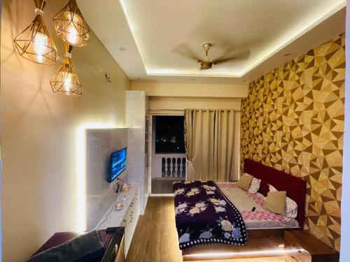 Un ou plusieurs lits dans un hébergement de l'établissement Nbstays kaveri city center