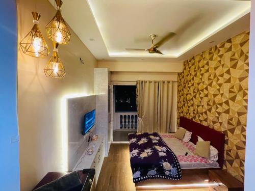 Un ou plusieurs lits dans un hébergement de l'établissement Nbstays kaveri city center