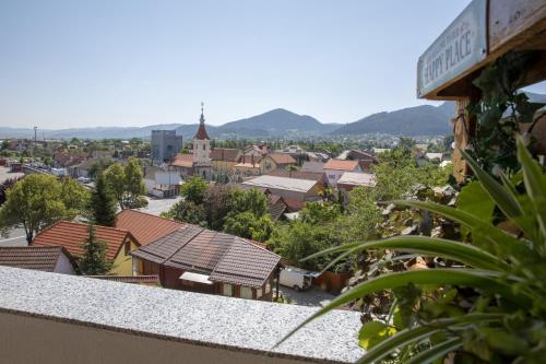 a view of a town from the roof of a building at Mountain and City View with Underground Parking in Braşov