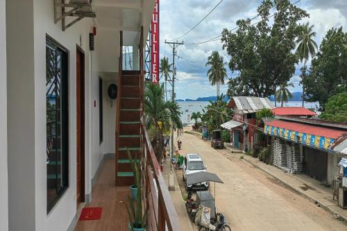 a view of a street from a building at Kamalay Pension House in Nagpoyopoyo Island