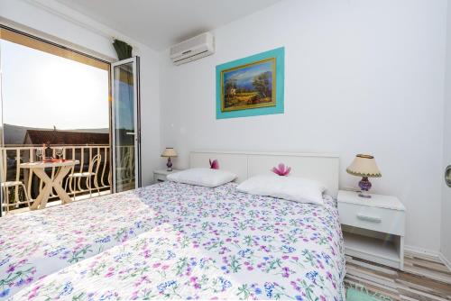 Ένα ή περισσότερα κρεβάτια σε δωμάτιο στο Apartment Fiorenini