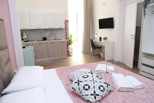 Kuchyň nebo kuchyňský kout v ubytování Partenope's Rooms