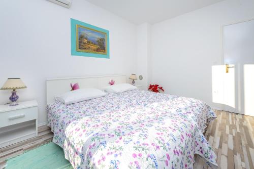 Ένα ή περισσότερα κρεβάτια σε δωμάτιο στο Apartment Fiorenini