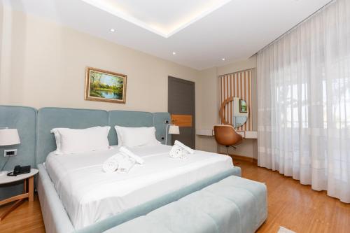 Cama o camas de una habitación en Imperial Visar Hotel