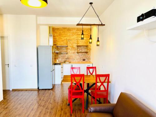 Kuchyň nebo kuchyňský kout v ubytování Ortachala Romantic Apartments
