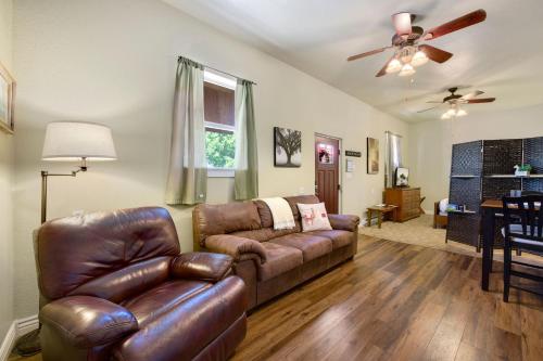 a living room with a couch and a chair at Llama-Stay at Spooky Tooth Ranch - Mtn Views! in Loveland