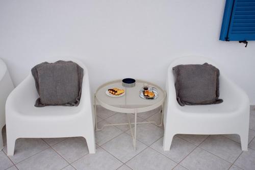 Posezení v ubytování Arourahomes Spetses Town Suites