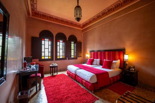 Una cama o camas en una habitación de Al Fassia Aguedal
