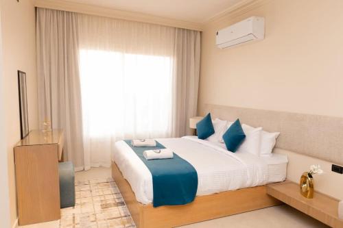 Cama o camas de una habitación en Luxury Modern Studio Ensuite By Beithady