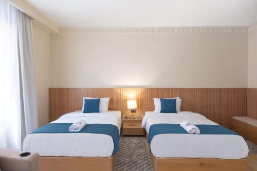 Ένα ή περισσότερα κρεβάτια σε δωμάτιο στο Luxury 3BR - 3 Ensuites - Pool - By Beithady - BH-26-401