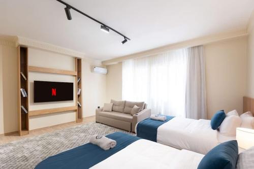 Ένα ή περισσότερα κρεβάτια σε δωμάτιο στο Luxury 3BR - 3 Ensuites - Pool - By Beithady - BH-26-401