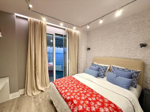 Ένα ή περισσότερα κρεβάτια σε δωμάτιο στο Limani Luxury Apartments Beachfront