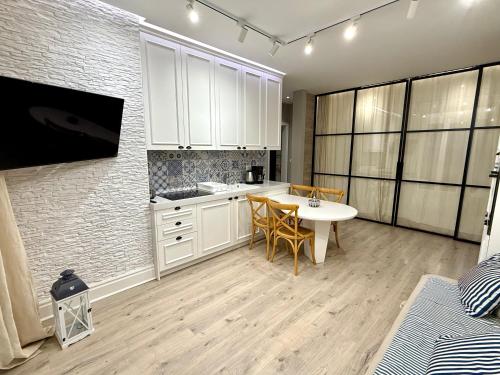 Η κουζίνα ή μικρή κουζίνα στο Limani Luxury Apartments Beachfront