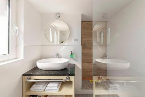 Un baño de Ražman Wine Rooms