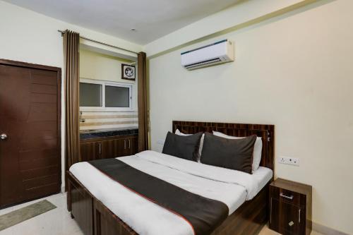 Postel nebo postele na pokoji v ubytování Hotel Midtown