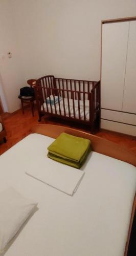 Postel nebo postele na pokoji v ubytování Apartments A & G Petrović