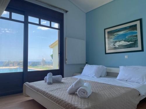 Postel nebo postele na pokoji v ubytování North Pool House