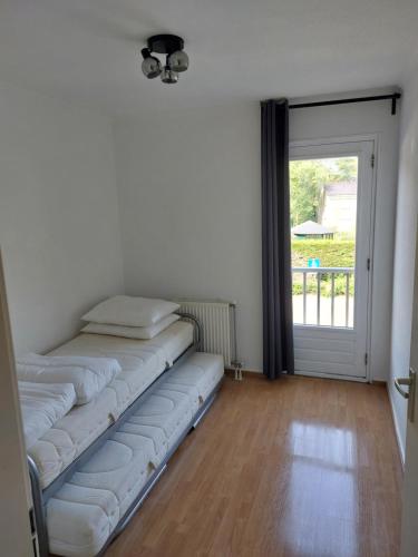 Katil atau katil-katil dalam bilik di Appartement Aemstelsigt