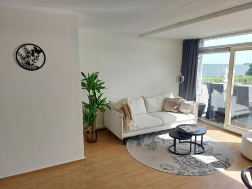 Ruang duduk di Appartement Aemstelsigt