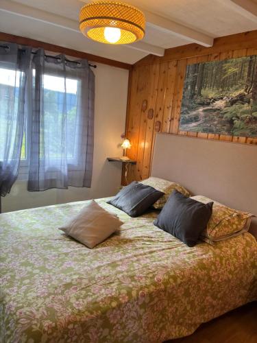 Postel nebo postele na pokoji v ubytování les biches du saut des cuves