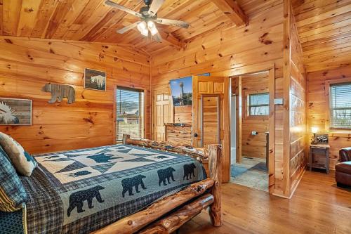 a bedroom with a bed and a ceiling fan at Hickory Haven By Avada Properties in Gatlinburg