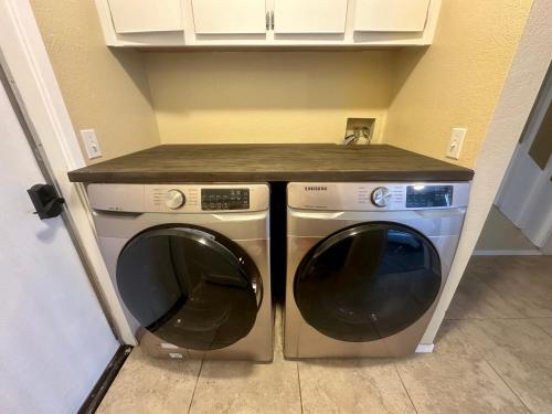 a washer and dryer in a small room at Beach Condo Room, Bath, Garage in Oceano