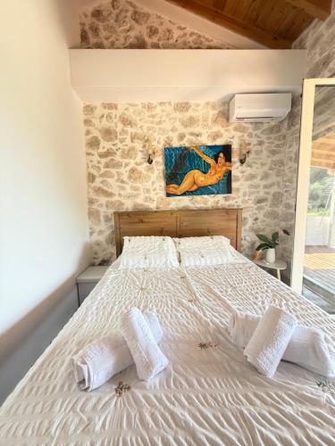 Postel nebo postele na pokoji v ubytování Art House Spartylas Corfu