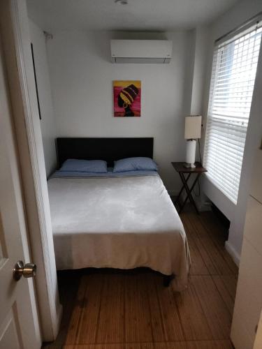 Katil atau katil-katil dalam bilik di Garden Apartment