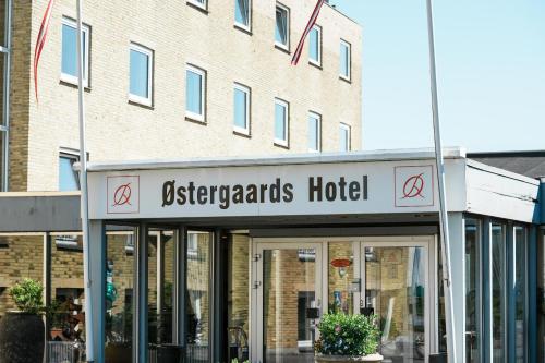 a sign for a psychopaths hotel in front of a building at Østergaards Hotel in Herning