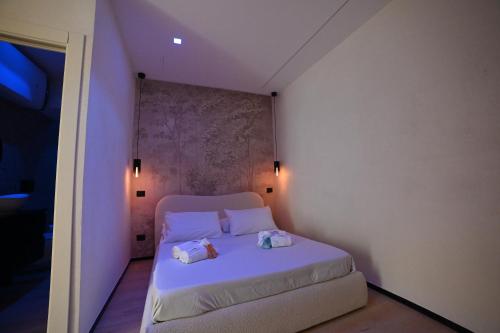 Giường trong phòng chung tại Gran Duca San Lorenzo Luxury House VICINO AEROPORTO DI BRINDISI check in H24