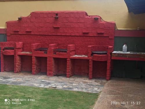 a building made out of red bricks at Oceanfront apartment in Morrocoy, Tucacas, PB in Tucacas