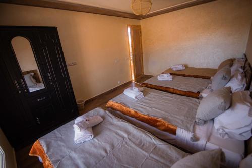 Postel nebo postele na pokoji v ubytování Maison d'hôte IGRANE