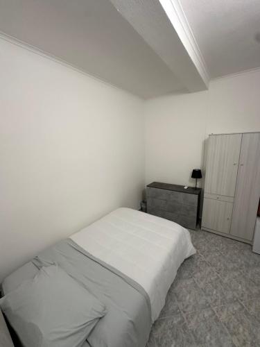 Postel nebo postele na pokoji v ubytování Eden Affittacamere