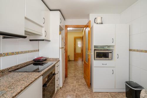 Køkken eller tekøkken på Tropicana Holiday Home