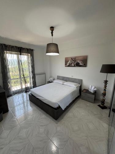 Postel nebo postele na pokoji v ubytování Yasmir Home