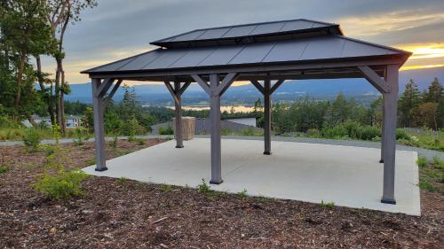 a gazebo with a solar panel on it at M&M's Maple Bay Mountain Guesthouse in Duncan