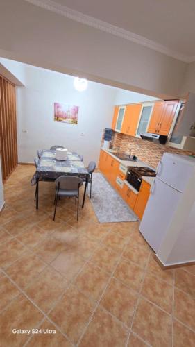 Kuchyň nebo kuchyňský kout v ubytování Apartament