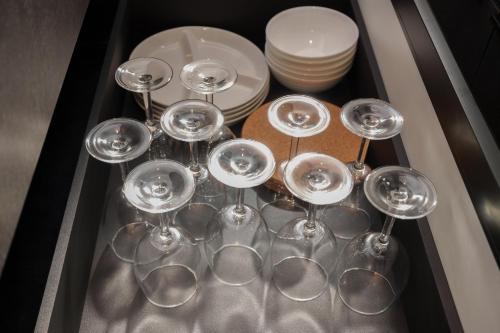 a bunch of wine glasses sitting in a sink at Mountain Green D "Japanese Heart" - Vacation STAY 08400v in Yufuin