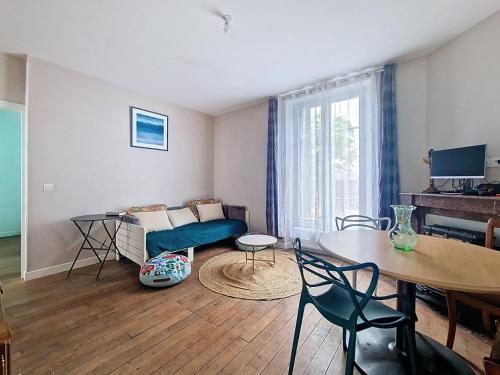 Ruang duduk di Appart 10 min de Paris