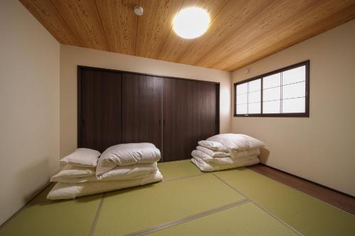 Postel nebo postele na pokoji v ubytování Mountain Green Yufu - Vacation STAY 09422v