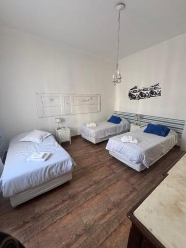 Ένα ή περισσότερα κρεβάτια σε δωμάτιο στο Oasis house Necochea
