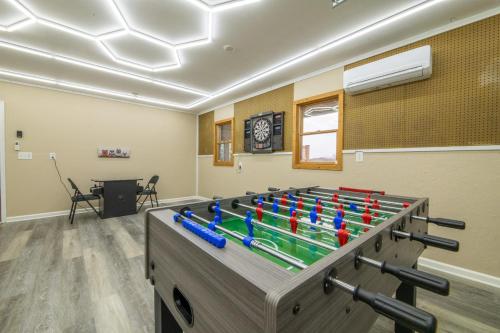 a large foosball table in a room at Kodak Moments By Avada Properties in Kodak