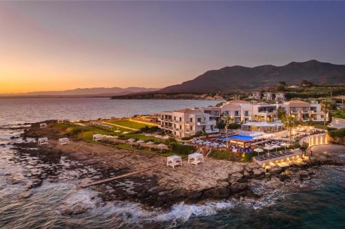 an aerial view of a resort on the water at Alas Resort & Spa in Elia Laconias