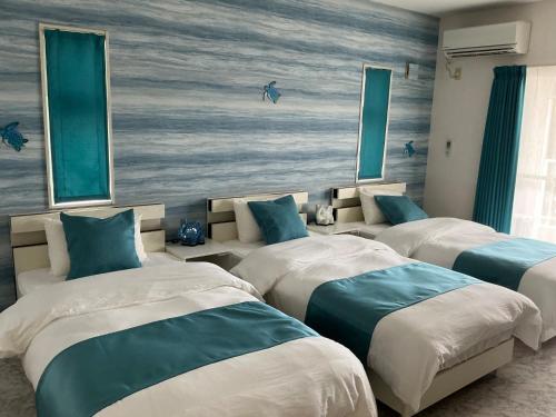 Postel nebo postele na pokoji v ubytování Sunrise Terrace Kin Town - Vacation STAY 16667v