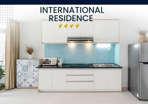 Η κουζίνα ή μικρή κουζίνα στο International Residence
